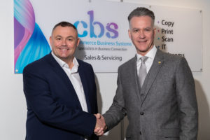 A picture of CBS managing director, John Green and Lasercharge managing director, Paul Irvine shaking hands.