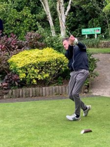 Paul Ulyett from CBS, taking a swing at a golf ball at Oakdale Golf Club in Harrogate.